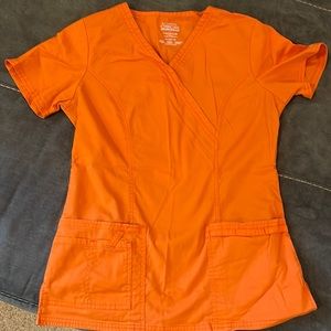 Woman’s scrub top.